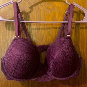 Deep purple lace bra with gold hardware.
